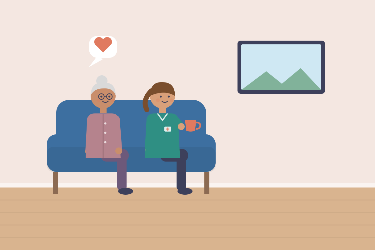 Seniorka i opiekunka oglądają film na kanapie z popcornem