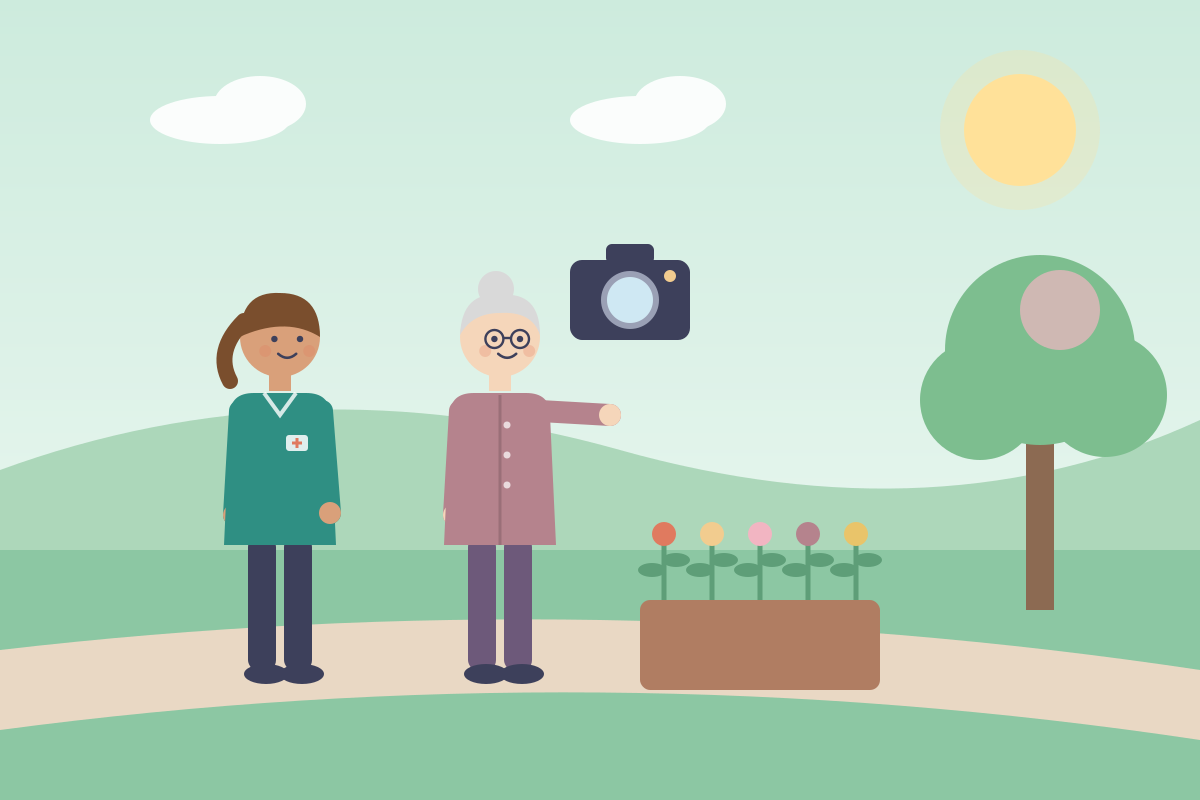Seniorka robi zdjęcie kwiatów w ogrodzie